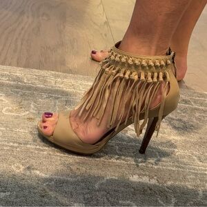 Size 10 Carlos Falchi nude color 4” heel with fringe at the ankle.